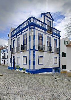 Traditional townhouse decorated with color accents, Belver, Portugal