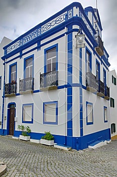 Traditional townhouse decorated with color accents, Belver, Portugal photo