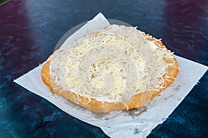 Traditional Transylvanian hungarian pastry, deep fried dough langos photo