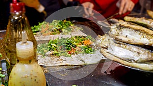 Traditional Turkish Balik Durum food being prepared on Istanbul street