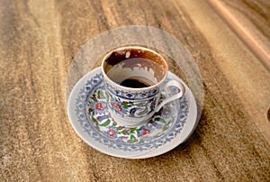 Traditional turkish coffee pot and dish with iznik tile gravures