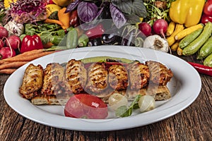 Traditional Turkish Cuisine, Grilled chicken wings baking on wooden background, top view