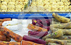 Traditional Turkish delight on the eastern bazaar. Oriental desserts and sweets