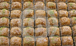 Traditional Turkish dessert Baklava on the stall. Sweets for iftar.