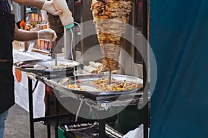 Traditional turkish food Doner kebab in a street vender. photo