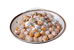 Traditional Turkish food, Mirik Kofte made from bulgur, onion and eggs with yoghurt
