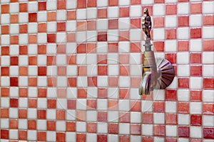 Traditional Turkish hamam with stone walls, sink photo