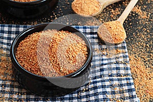 Traditional Turkish Homemade Dry Soup `Tarhana` grains in casserole bowl on fabric napkin