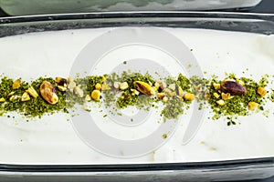 Traditional Turkish Ice Cream Maras,vanilla in glass with pistachio powder