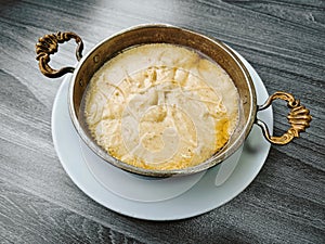 Traditional Turkish meal called Mihlama or Kuymak served in a hot pan