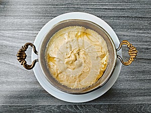 Traditional Turkish meal called Mihlama or Kuymak served in a hot pan