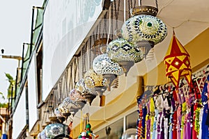 Traditional turkish or moroccan light mosaic lamp. Colorful stained glass lamp in souvenir shop