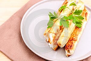 Traditional Turkish Pastries sigara borek - Deep Fried pies with cottage cheese and parsley