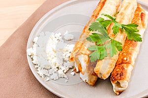 Traditional Turkish Pastries sigara borek - Deep Fried pies with cottage cheese and parsley