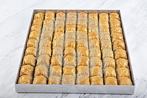 Traditional Turkish Pastry Dessert pistachio Baklava. Baklava shop. Turkish pistachio and yufka dessert, pistachio baklava on a