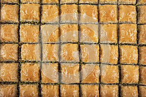 Traditional Turkish Pastry Dessert pistachio Baklava. Baklava shop. Turkish pistachio and yufka dessert, pistachio baklava on a