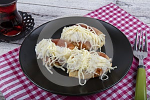 Traditional Turkish pastry pogaca with cheese filling with dill. Turkish name: Sakalli, sacakli, corek - pogaca