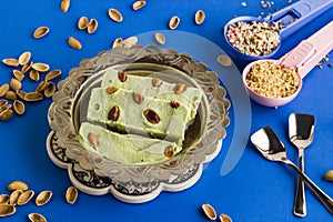 Traditional Turkish Pistachio Maras Ice Cream sliced in the vintage copper bowl