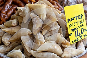 Traditional Turkish sweet dessert pestil or muska dried fruit pulp snack