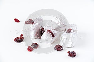 Traditional Turkish sweets with cranberries on a white background