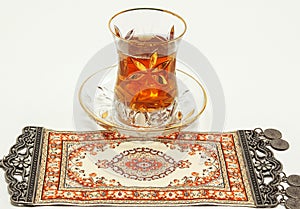 Traditional turkish tea set with turkish carpet