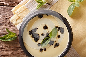 Traditional Turkish Yayla soup with mint and yogurt close up horizontal top view