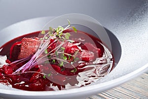 Traditional ukrainian borsch with sprouts.