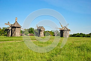 Traditional Ukrainian historical windmills at museum of Ukrainian national architecture in Pirogovo village