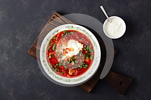 Traditional  ukrainian russian traditional beet red soup - borscht with sour cream