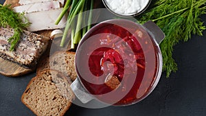 Traditional Ukrainian borscht . Bowl of red beet root soup borsch with white cream . Beet Root delicious soup .