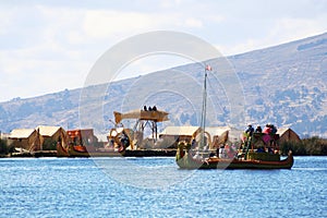 Traditional uros boat, in uros island, Puno, Peru Peruvian andes photo