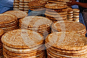 Traditional Uyghur flat bread on a market stall in Kashgar. photo