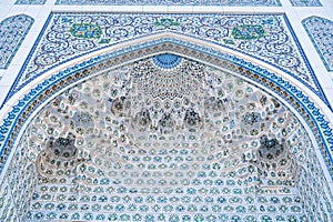 traditional Uzbek ceramic tile decor with oriental Arabic patterns and ornaments on portal of Minor Mosque in Tashkent