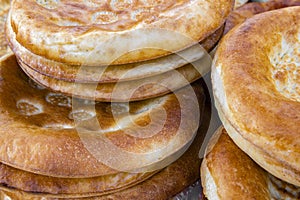Traditional uzbek obi-non bread close-up, Uzbekistan photo