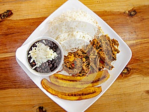 Traditional Venezuelan pabellon dish made with beans, rice, beef and plantain