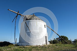 Traditional very old windmill in Vejer de la Frontera, Spain photo