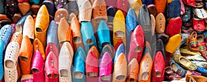 Traditional vibrant Moroccan slippers - `babouches` on the market in Fez, Morocco