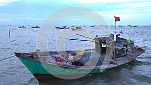 Traditional Vietnamese boats after fishing at a pier. The village in Vietnam. The island in Vietnam. Pier with fishing