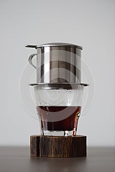 Traditional Vietnamese filtered coffee brewed in phin minimalist style