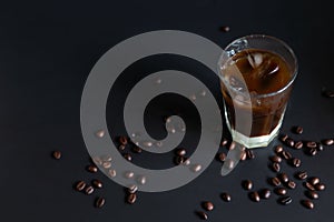 Traditional vietnamese iced coffee with condensed milk and coffee beans, copy space