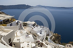 Traditional view of houses above the sea in Oia, Santorini, Greece.