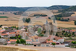 traditional village on the Castilian plateau in Spain with Romanesque Catholic church