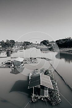 Traditional vinatge local floating house or raft house in river, Uthaithani, Thailand