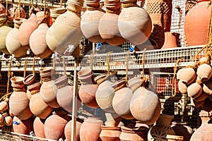 Traditional water jugs for sale on souk, Oman
