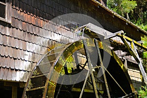 Traditional water mill of German immigrants in photo