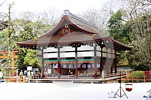 A traditional water pavilion in Shimogamo Shrine photo