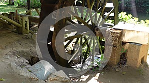 Traditional watermill classic old wood river mill in Asian rural area