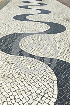 Traditional wave shaped pavement in Portugal, Europe