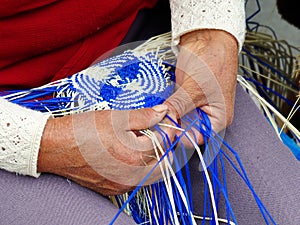 Traditional weaving of ecuadorian Panama Hat or Paja  Toquilla Straw Hats photo