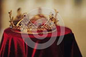 Traditional wedding crowns in a church. Wedding Crown Accessory photo